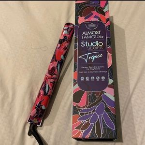 Almost famous straightener brand new w box